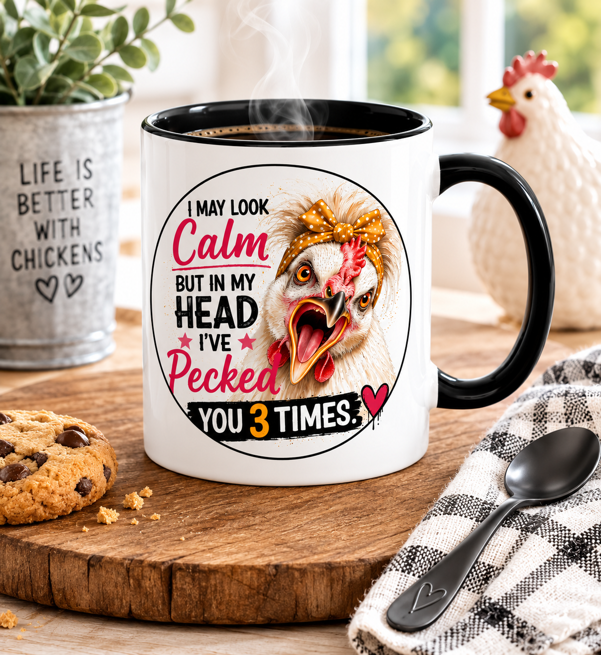 White 15 oz ceramic mug with black handle featuring Lucy the Silkie chicken and the saying "I May Look Calm But In My Head I've Pecked You 3 Times," filled with hot coffee on a rustic wooden table with cookies, farmhouse décor, and cozy country kitchen accents.